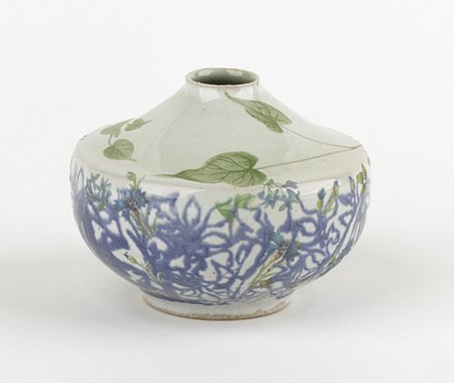 Blue and White Vase with Green Leaves